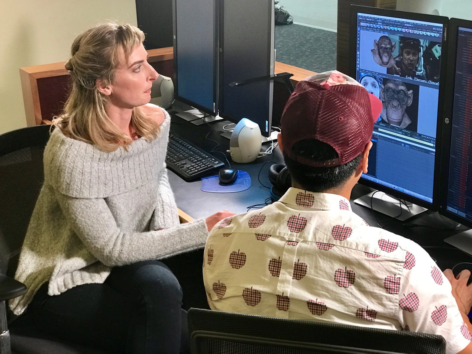 Reviewing work at a workstation at Weta