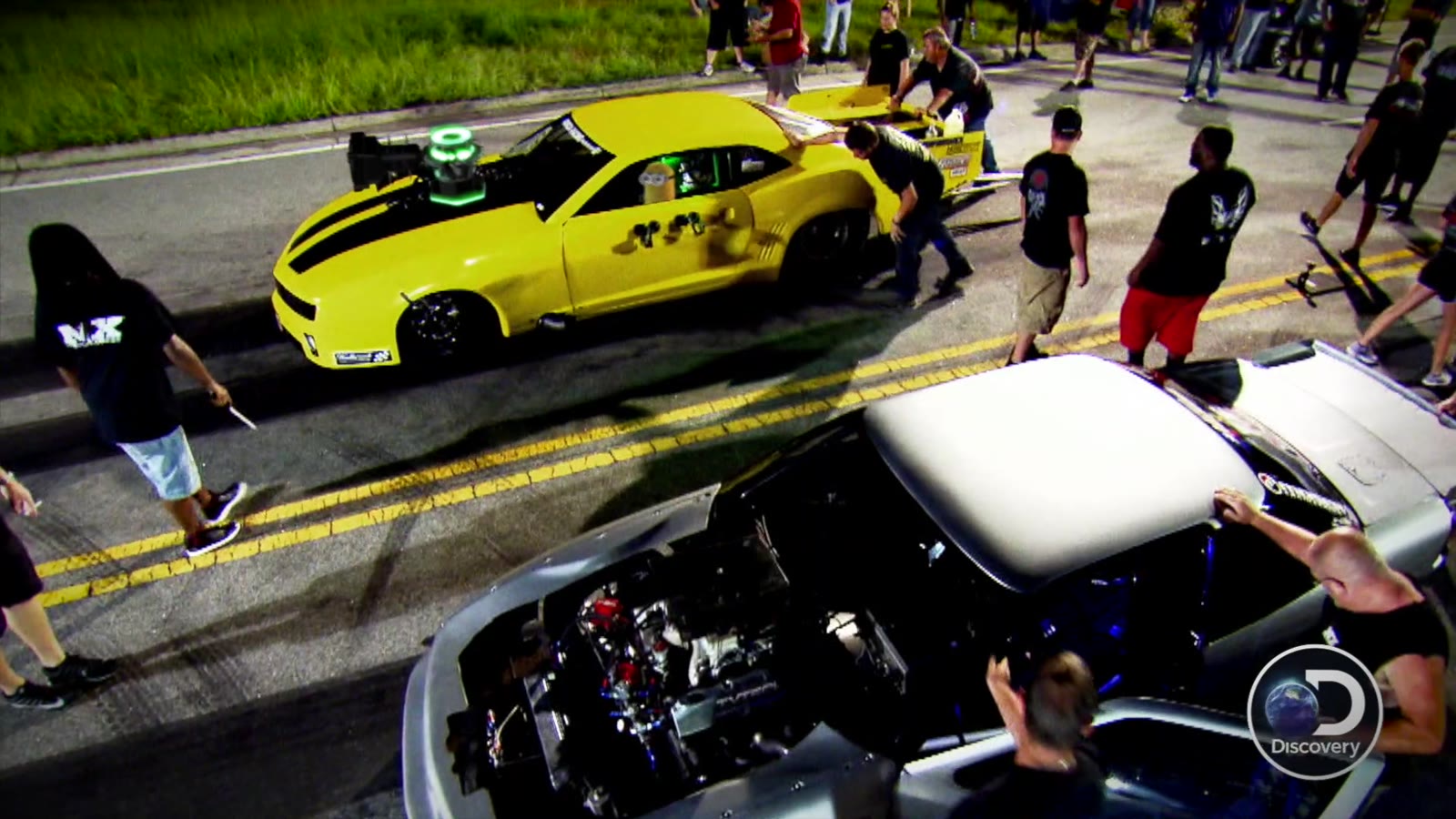 Two cars launching off the line